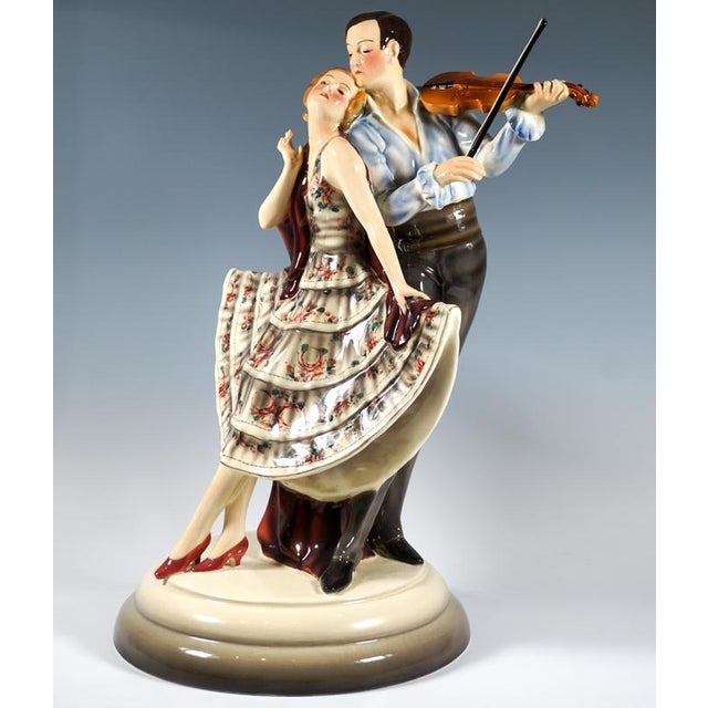 Excellent goldscheider art déco figure group of the 1930s: gallant couple: a dancer in a fan-shaped, flared dress with...