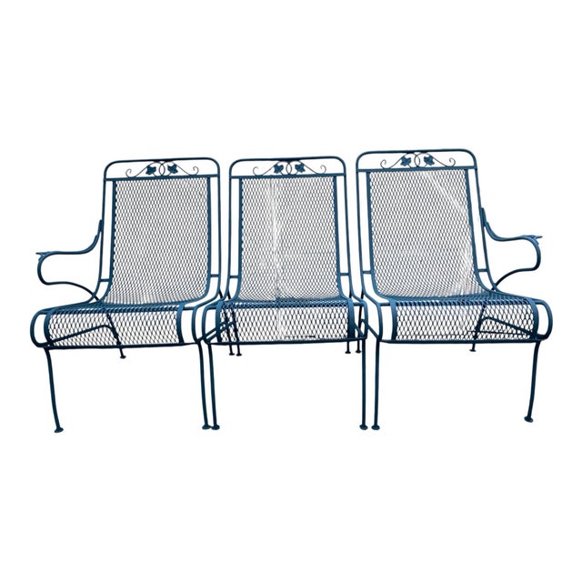 A very fine example of the best of Woodard mid century wrought iron garden furniture. A three piece bench with beautifully...