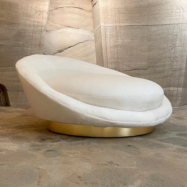 For your consideration, a 1970s big loveseat sofa satellite lounge chair. Wide gold platform base. By Milo Baughman....