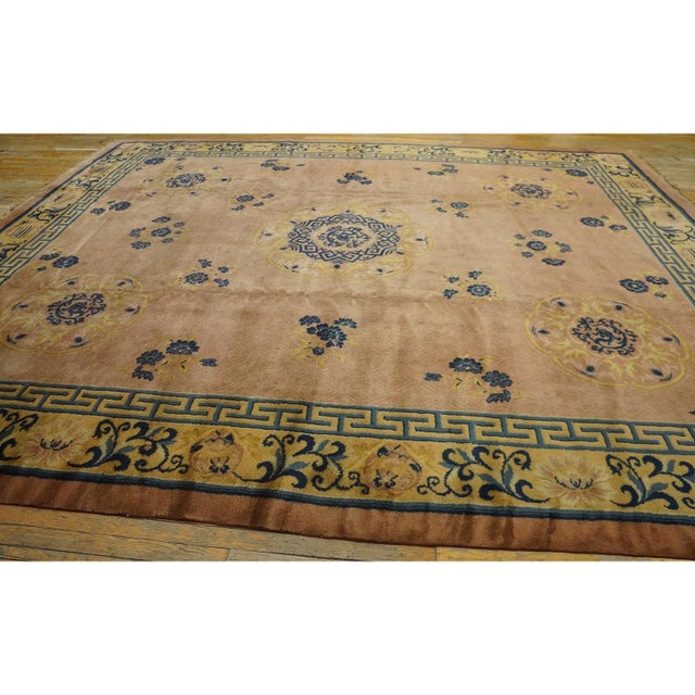 Antique Chinese Room Size Wool Dusty Rug, Circa Date: 1900s. This exceptional example of early 20th-century Chinese...