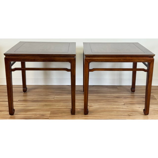 Pair of vintage Mid Century Henredon furniture Ming style walnut side tables featuring timeless elegance and sleek...