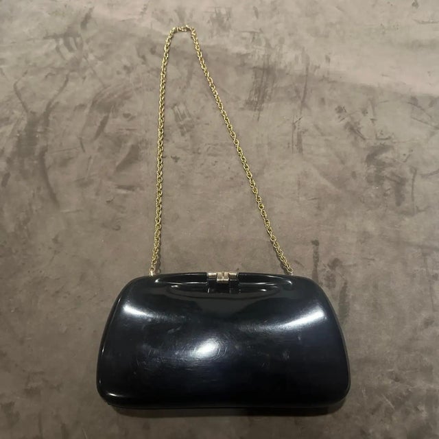 This stunning piece is a beautiful example of Art Deco and post-war design, showcasing the sophisticated use of Bakelite...