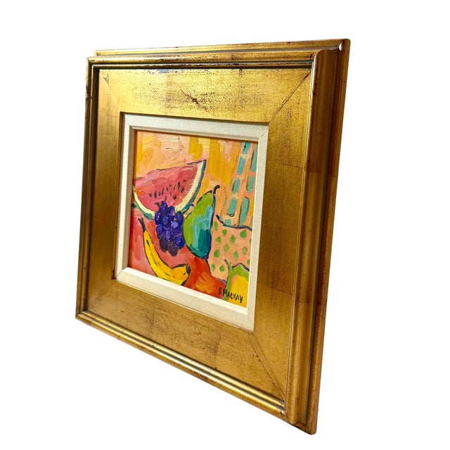 A charming and colorful still life painting by listed artist S. Maekay, depicting an abundant arrangement of fruit...