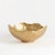 This organic decorative, hand-sculpted bowls is made to be on display. With a golden finish and irregular edge, styled or...