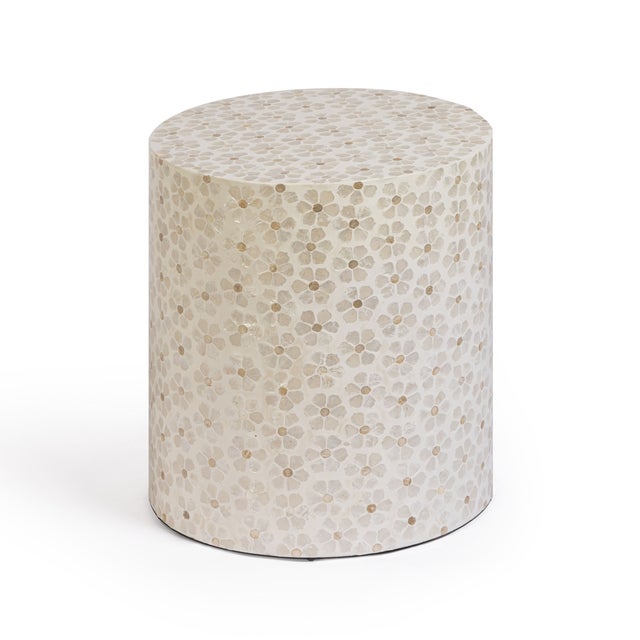 The Lorna Stool brings a touch of soft, coastal romance to any space. Hand-placed, hand-polished natural shells shimmer...
