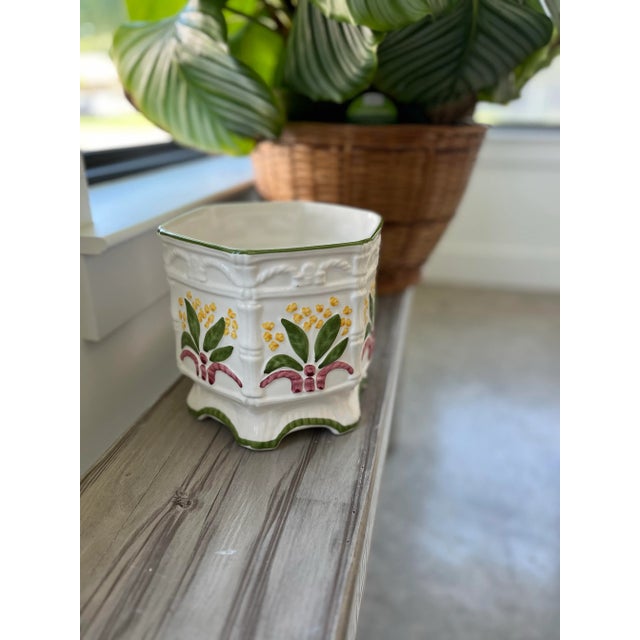 Take a look at this lovely, little, lily-of-the-valley cachepot. A fabulous hand-painted, six-sided, footed, piece by Jay...