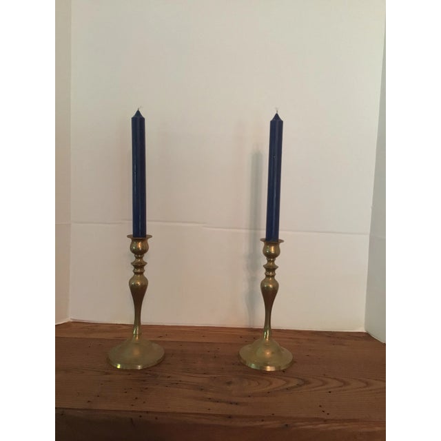 A nice pair of solid brass candle holders with simple elegance.