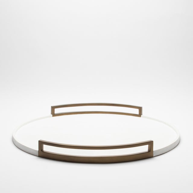 This round tray by R&Y Augousti is the epitome of opulence, where artistry and luxury converge in perfect harmony. The...
