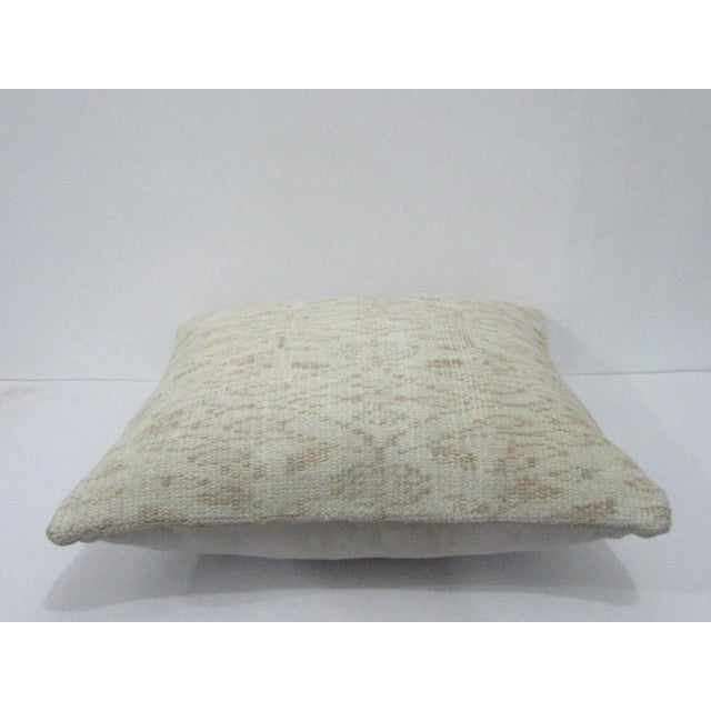 Decorative pillow cover made from a vintage Turkish handknotted rug. Backed with good quality cotton fabric. Pillow...