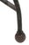 Wrought iron saddle seat window bench having a U shaped top with curlicue sides, over an opposing U shaped base, with...