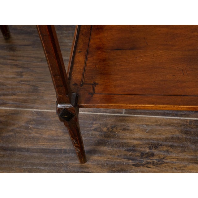 A pair of French mahogany bedside tables from the 19th century with tray tops, two drawers each, discreet banding, lower...