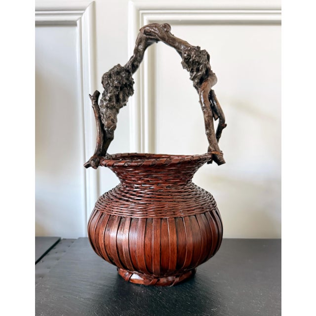 This lovely antique Japanese bamboo basket was from an unknown artist circa late Meiji Period (1868-1912), likely turn of...