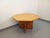 Vintage octagonal dining table from the 1980s, made of pine wood, with a central extension leaf and a four-sided cross...