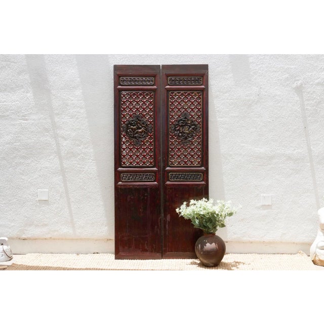 Invite the intricate artistry and rich history of the Far East into your home with this magnificent pair of early 20th...