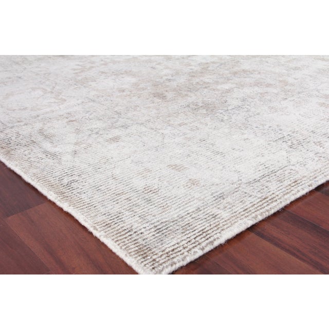 Make a statement with this dreamy accent rug. Handmade with wool and viscose, the Biron rug blends a touch of old-world...