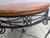 A forged metalwork table in a retro style. The table is made of forged steel, also known as metalwork. The tabletop is...
