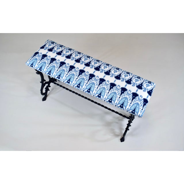 A sweet antique Cast Iron window bench in vibrant blue & white cotton Linen Ikat upholstery. Versatile, solid ready for...