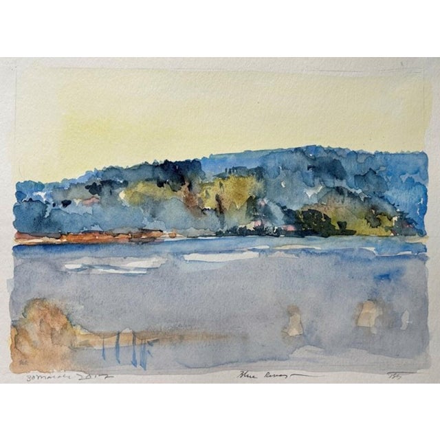 This watercolor piece captures the serene beauty of the Colorado landscape, depicting a tranquil river bordered by softly...