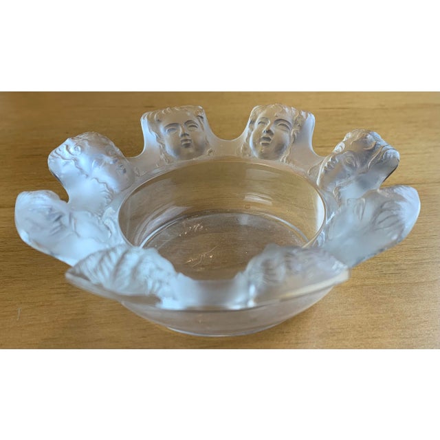 Vintage Lalique ‘Saint Nicolas' Crystal Cherub Ashtray with angel face border detail. Signed Lalique, Made in France.