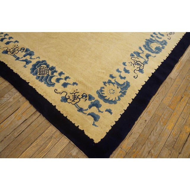Enchanting Beige Background Color and Black Border With Tone-on-Tone Pattern Antique Chinese Peking Rug For Sale - Image 9 of 12