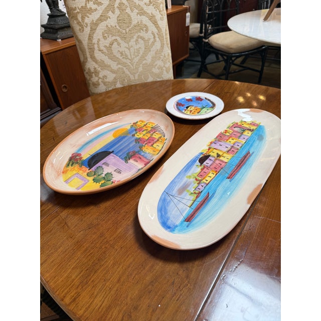Design Plus Gallery presents a Set of Three La Fenice Collection Platters by VIETRI. The platters showcase the vibrant...