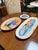 Design Plus Gallery presents a Set of Three La Fenice Collection Platters by VIETRI. The platters showcase the vibrant...