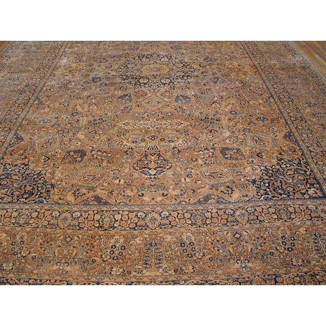 Antique Persian Mashhad rug, Size: 13'4" x19'1". Antique Large Mashad Persian Knotted Rug, Circa Date: 1920s. This...