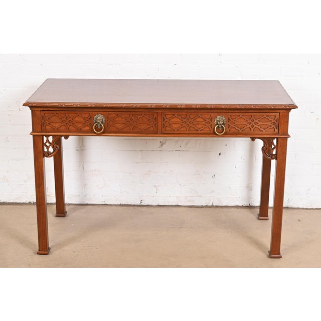 A gorgeous Georgian or Chippendale-style writing desk, console table, or sofa table By Baker Furniture, "Historic...