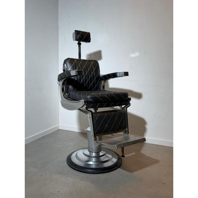 Iconic vintage barber chair, model Apollo II, produced by Belmont, one of the most respected manufacturers of professional...