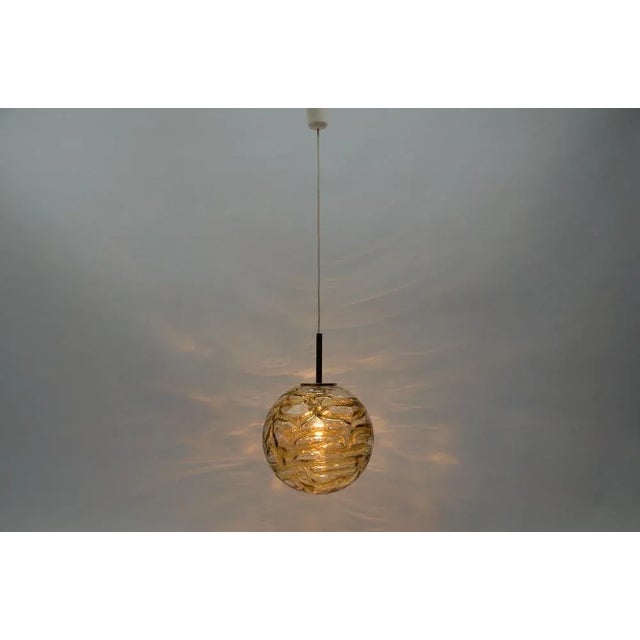 Yellow murano glass ball pendant lamp by doria, 1960s germany dimensions diameter: 11.81 in. (30 cm) height: 41.33 in....
