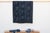 A masterwork of Malian textile heritage featuring deep indigo saturation and symbolic geometric motifs. Originating from...