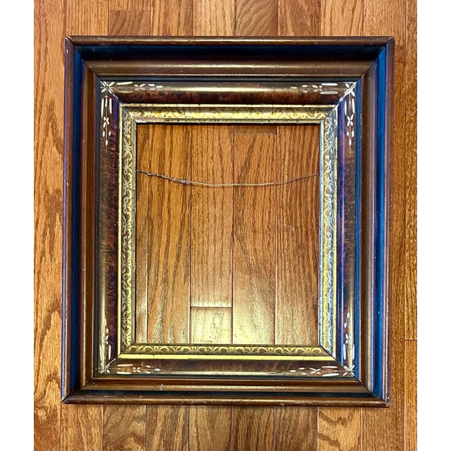 Beautiful, ornate, antique Victorian walnut shadow box picture frame. Made for a picture measuring 10” x 12”.