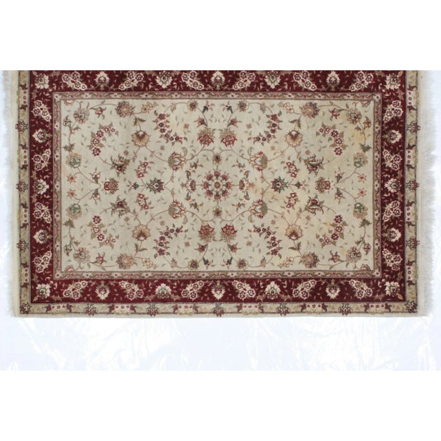 Silk and wool pile Persian Tabriz style rug hand woven in China. Thick pile. Slightly used.