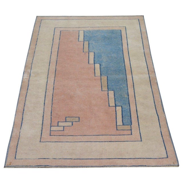 Hand-knotted with care using traditional rug-making techniques, this wool rug blends timeless craftsmanship with a modern...