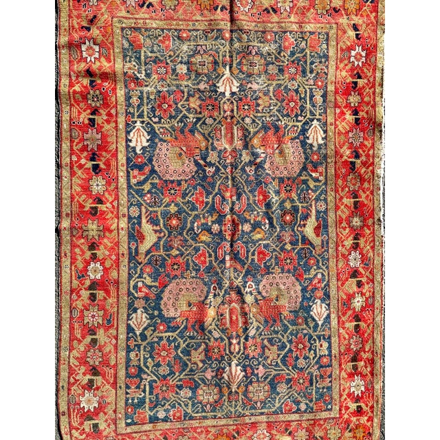 Dimensions: L 78" / W 49" A beautiful and well preserved handwoven Persian Malayer wool rug featuring floral and geometric...