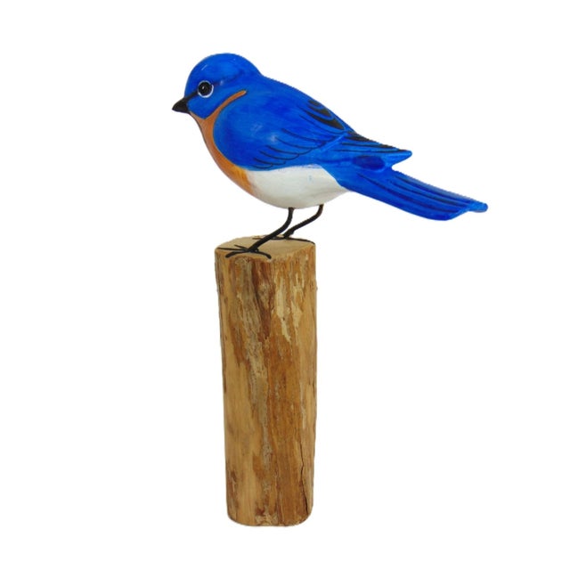 Charming hand carved hand painted bluebird. The sculpture stands 8" tall, and is 5 3/4" wide (from tail to beak). From a...