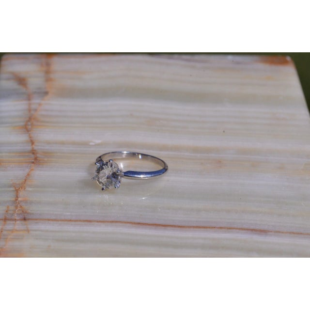 The New Hope Platinum Solitaire Ring set with 1.12 ct Old Mine Cut Diamond. The diamond has an approximate Gemological...