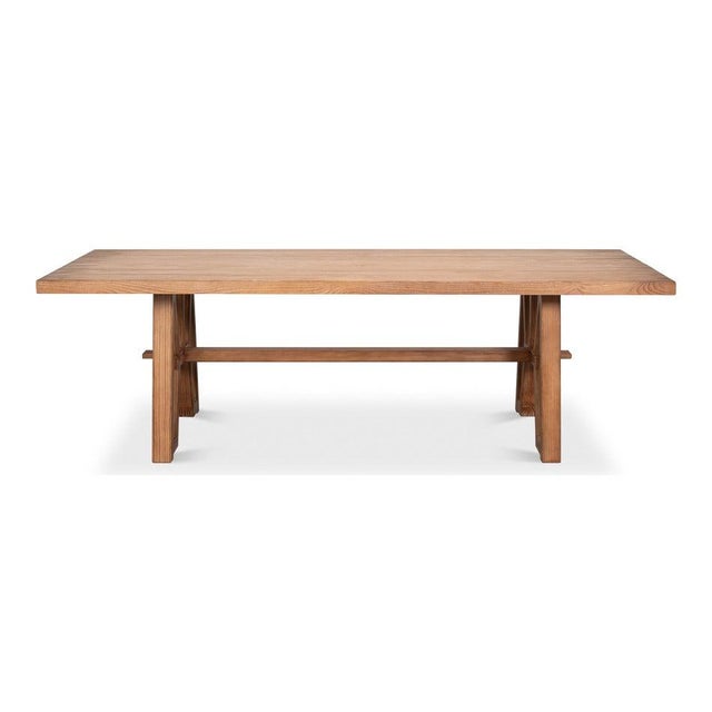 Naturally aged pine spans 98 inches above two substantial trestles, with a thick square edge around the plank top. The...