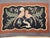 A charming and whimsical example of early American textile folk art, this hand-hooked rug from the early 20th century...