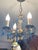 Fabulous small ornate bronze pendant chandelier with cut blue crystals. Unique design.