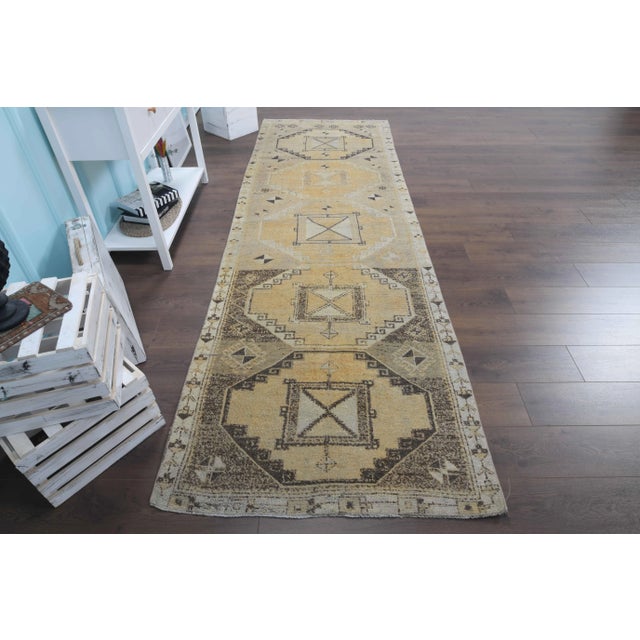 Vintage Turkish Hand-Knotted Runner Rug is a semi-Vintage rug. '60s Eastern region of Turkey's unique rug is perfectly...