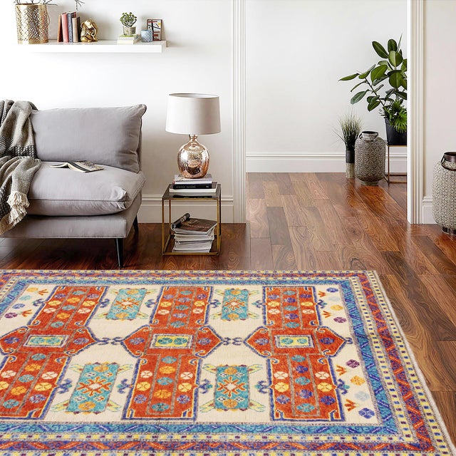 A mesmerizing addition to any decor, this exhilarating hand-knotted rug featuring exquisite coloration in an intricate...