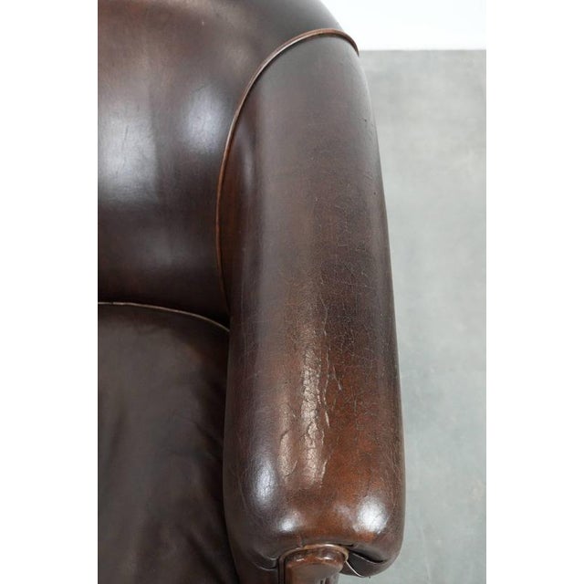 Brown Stylish and Characterful Dark Brown Vintage Club Armchair in English Style Made of Sheepskin with Matching Piping For Sale - Image 8 of 16