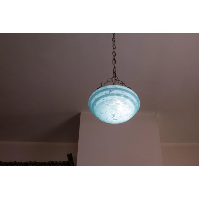 Stunning navy blue glass pendant. Period: 1970. Light measures 100 centimeters with chain, 30 centimeters without chain,...