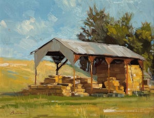 Stacked by Samantha Buller | Oil Painting of a hay shed with stacked bales in a field.