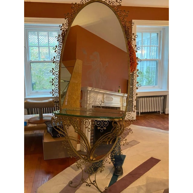 Magnificient Unique Italian Gilt Wrought Iron Framed Oval Wall Mirror With Etched Fancy Glass Shelf. This Stunning Mirror...