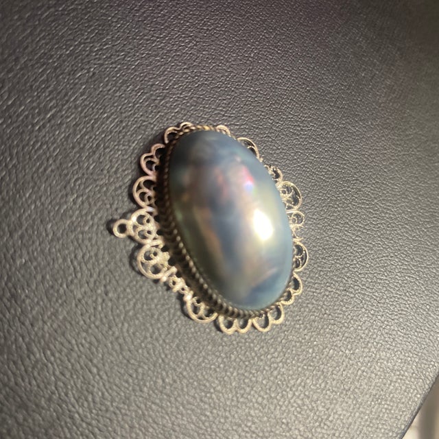 Coque de perle (French for "pearl shell") is an antique faux pearl crafted during the Georgian era (18th century) from the...
