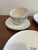 This elegant Royal Jackson “Parisienne” dinnerware set showcases a refined black botanical motif accented with subtle...