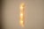 There is a quiet elegance in the way Murano glass captures and transforms light. This wall lamp, known as the “Bambu”...