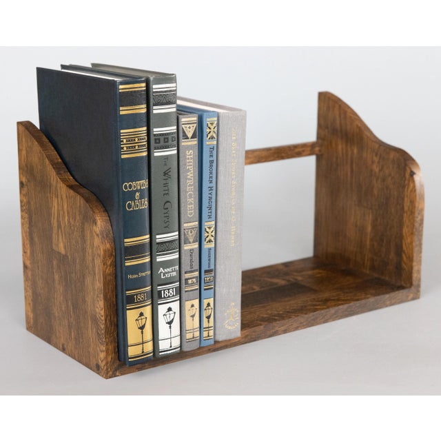 A fine vintage Mid-Century English tiger oak book trough / book rack / book stand, circa 1950. This stylish table top book...